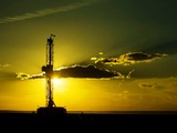 Silhouette of drilling rig in Wamsutter, Wyoming USA